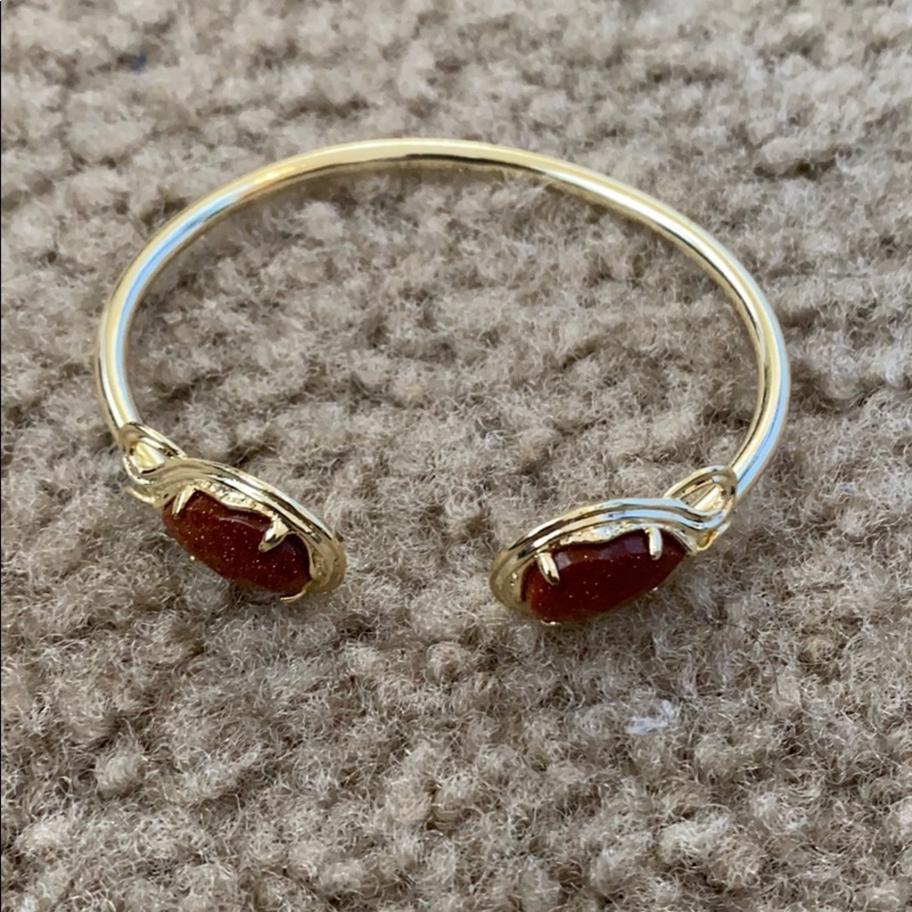 Burnt Orange and gold Kendra Scott bracelet.